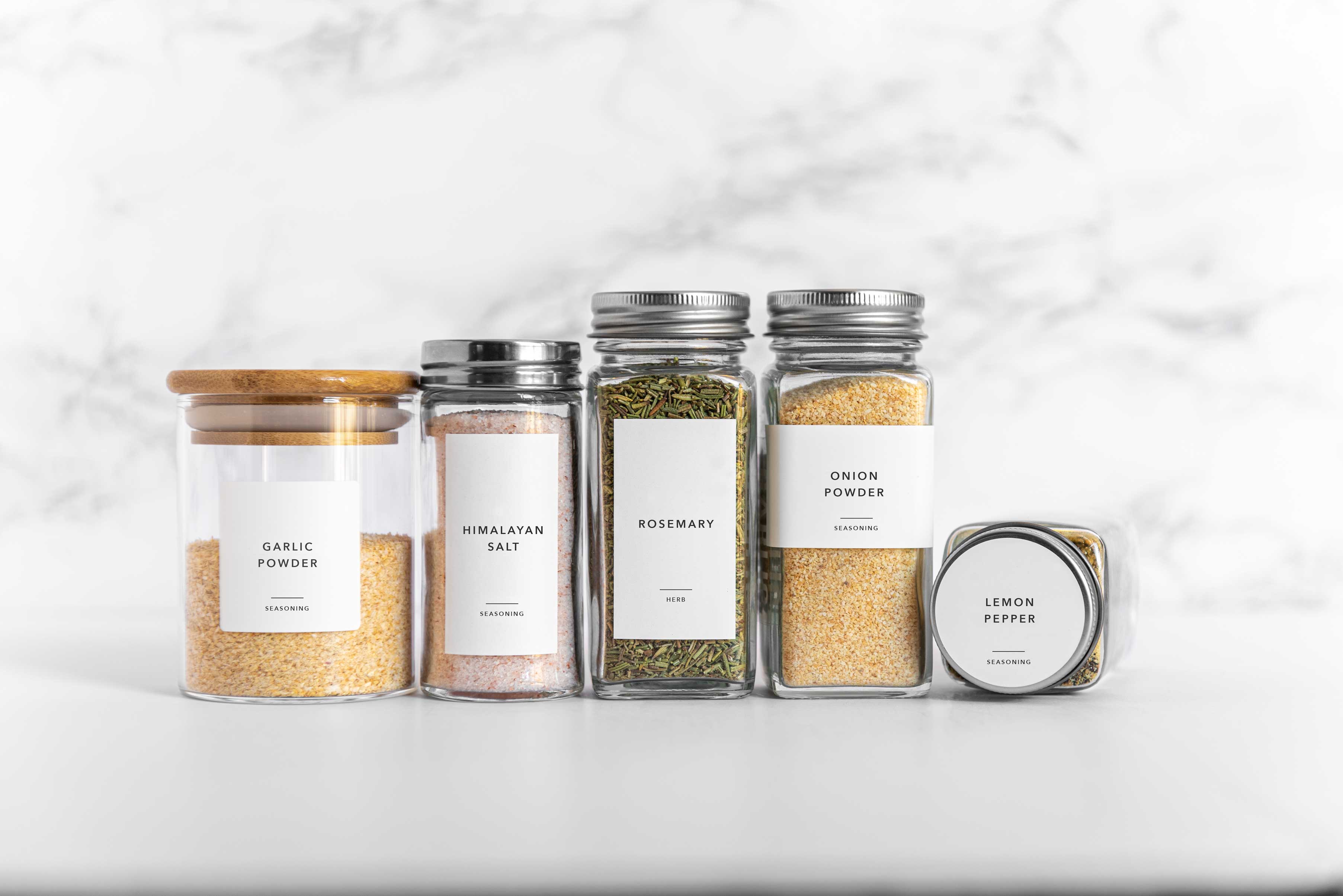 Paper and Pantry Co. custom spice jar labels on a kitchen counter